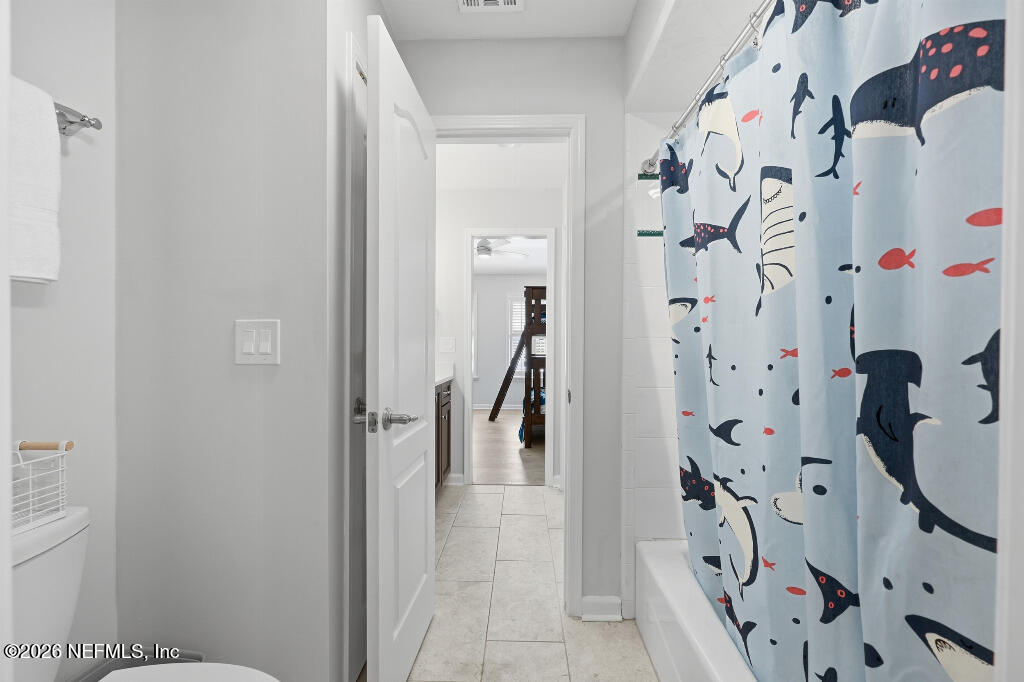 7956 Hollyridge Road Jacksonville, FL 32256 - Photo 39 of 50 a view of entryway with wooden floor