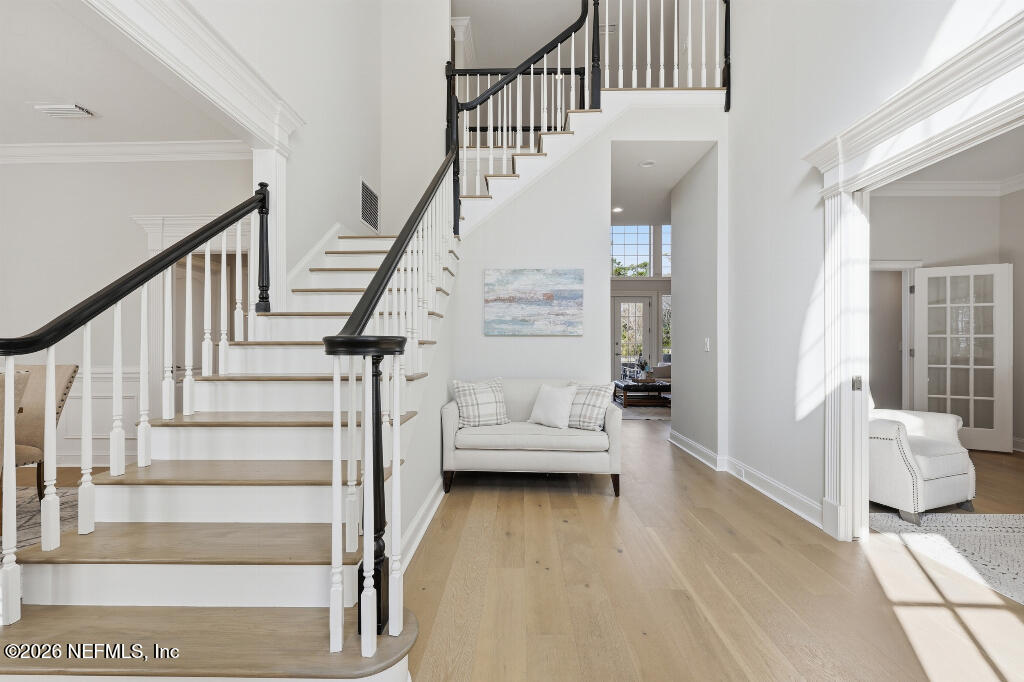 7956 Hollyridge Road Jacksonville, FL 32256 - Photo 4 of 50 a view of entryway and hall with wooden floor