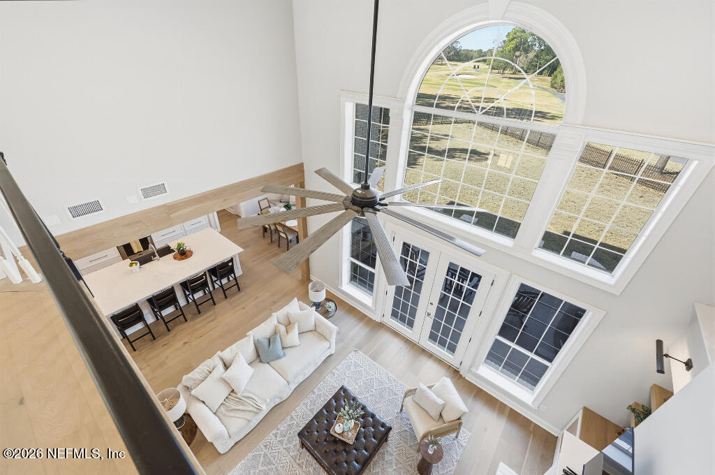 7956 Hollyridge Road Jacksonville, FL 32256 - Photo 42 of 50 view of a living room with furniture and a large window