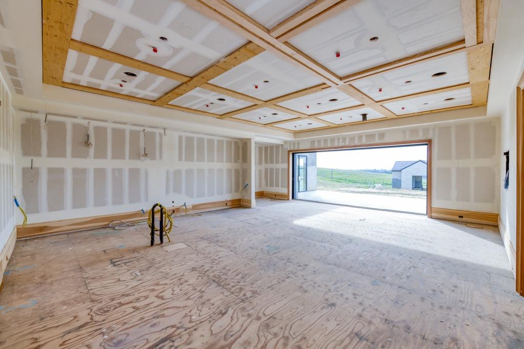 12685 Willow Bluff Clovis, CA 93619 - Photo 25 of 70 Family Room, plumber for bar. Note Lanai door leading to back patio. Whole house speaker zones throughout property