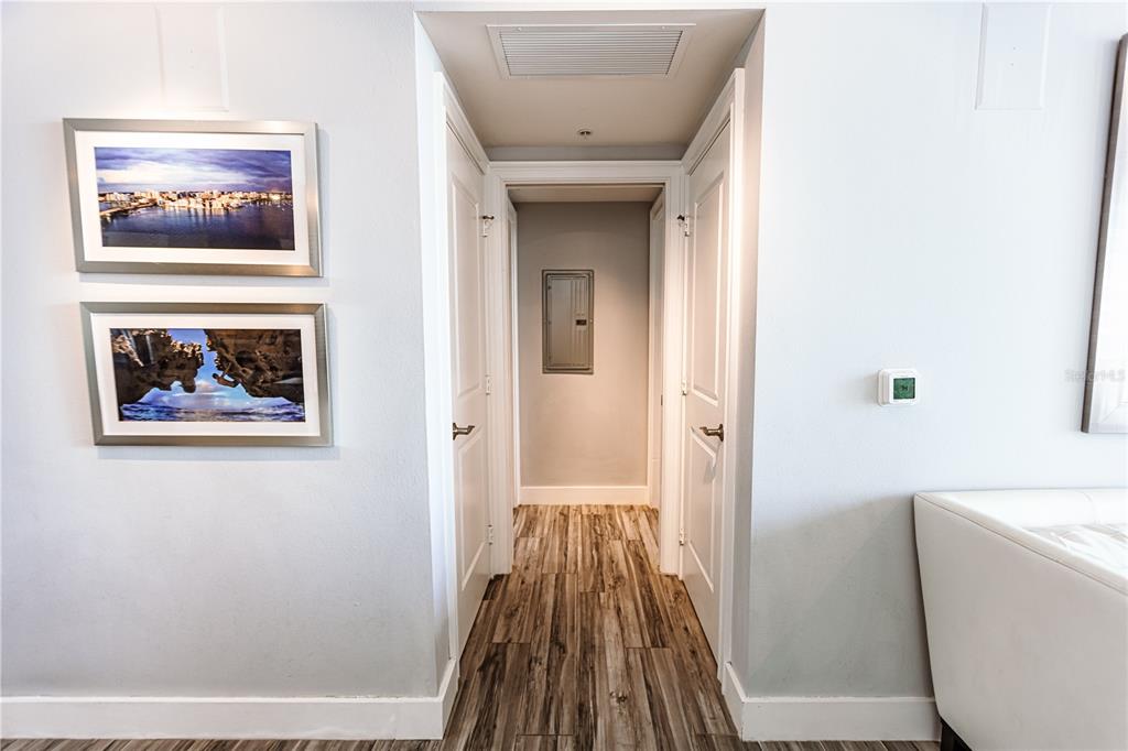 1350 Main Street, Unit 709 Sarasota, FL 34236 - Photo 20 of 56 a view of a hallway with a painting on the wall