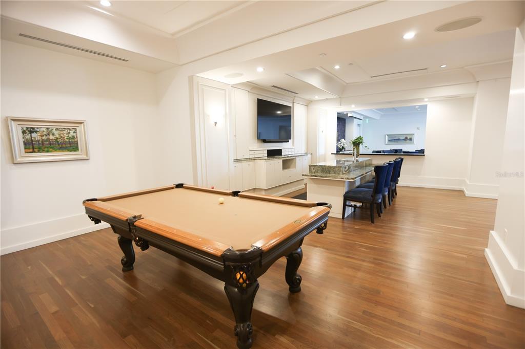 1350 Main Street, Unit 709 Sarasota, FL 34236 - Photo 35 of 56 a room with furniture pool table and wooden floor