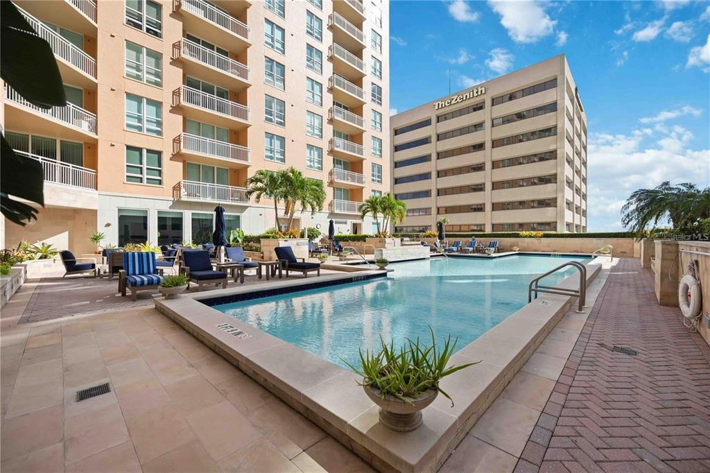 1350 Main Street, Unit 709 Sarasota, FL 34236 - Photo 38 of 56 a view of swimming pool with outdoor seating