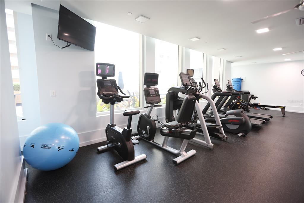 1350 Main Street, Unit 709 Sarasota, FL 34236 - Photo 43 of 56 a view of a room with gym equipment