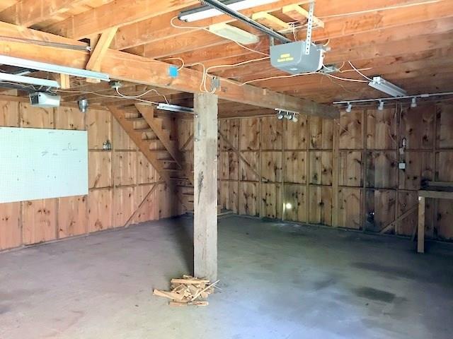 3519 Middle Road Sidney, ME 04330 - Photo 27 of 31 Garage interior with storage above.