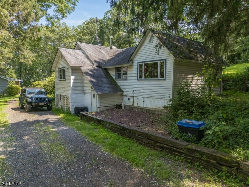 20 South Polktown Road Hampton, NJ 08827 - Photo 20 of 44 a front view of a house with a garden