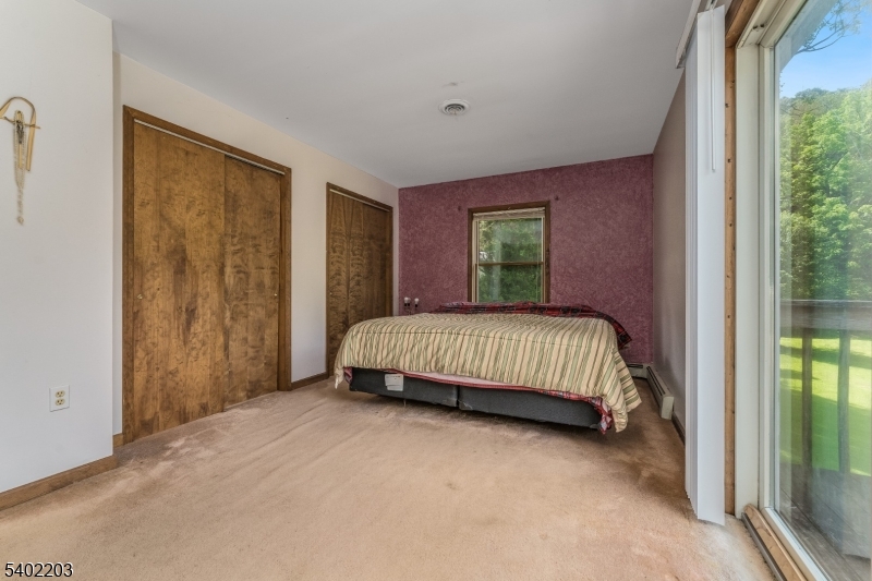 20 South Polktown Road Hampton, NJ 08827 - Photo 29 of 44 a bedroom with a bed and window