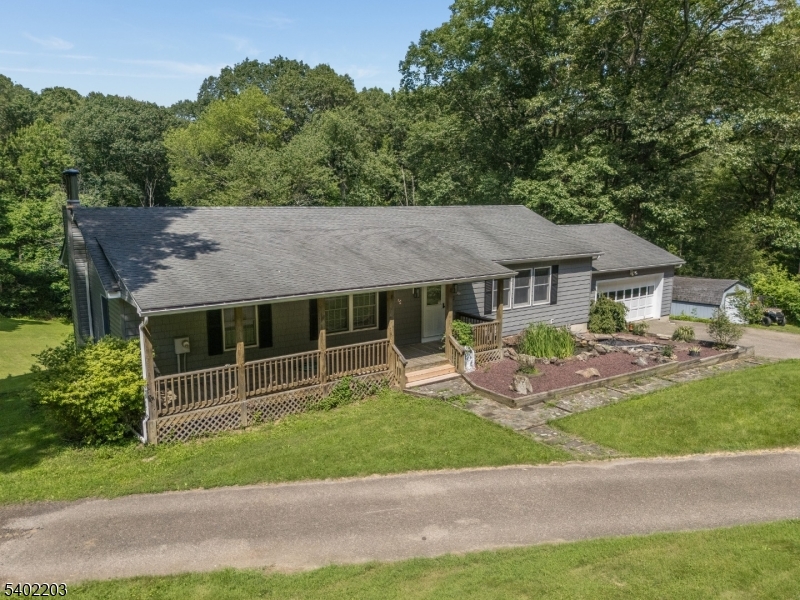 20 South Polktown Road Hampton, NJ 08827 - Photo 35 of 44 a aerial view of a house with a garden and yard