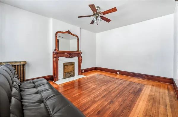 a bedroom with a bed and a fireplace