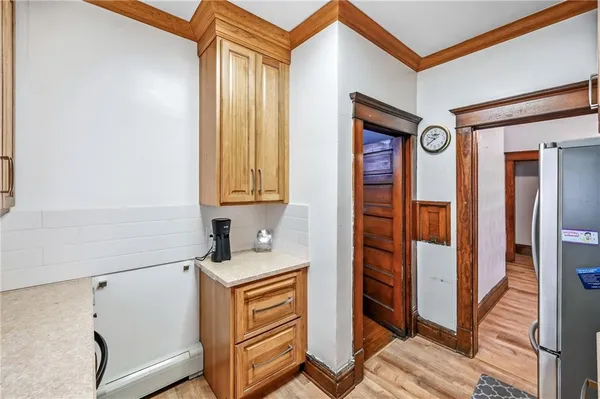 a bathroom with a sink a mirror and a shower