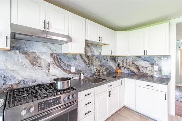 $309,000 | 1211 North Cedarcrest Drive, Independence, MO 64056