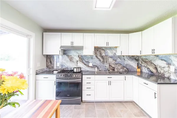 $309,000 | 1211 North Cedarcrest Drive, Independence, MO 64056