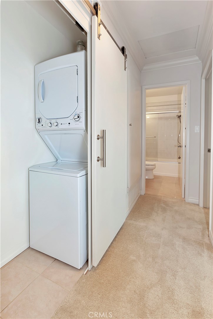 4625 Green Tree Lane Irvine, CA 92612 - Photo 18 of 29 a view of a utility room with washer and dryer
