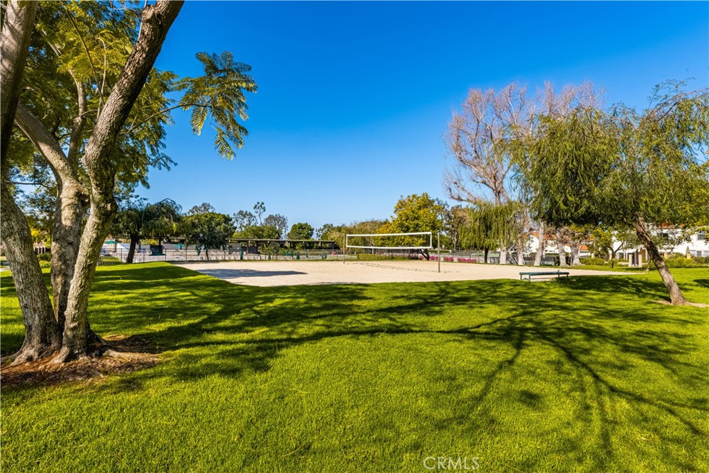 4625 Green Tree Lane Irvine, CA 92612 - Photo 26 of 29 a view of a swimming pool with an outdoor space and seating area