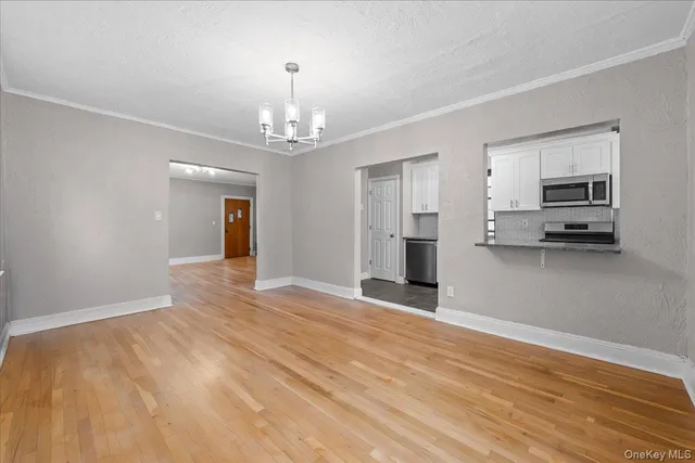 a view of a kitchen with a sink and dishwasher
