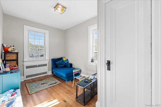 a room with toys and a book shelf