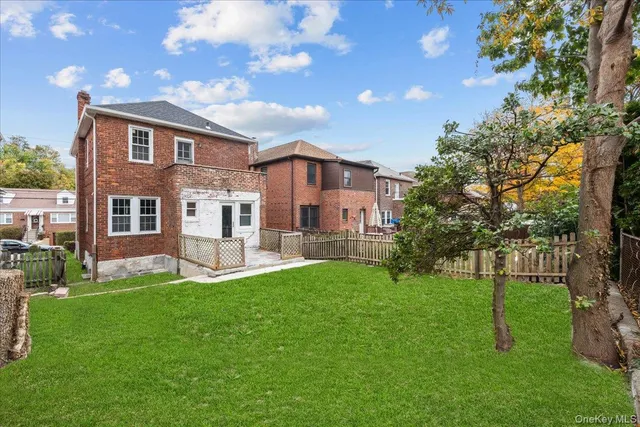 a view of a bench in a backyard