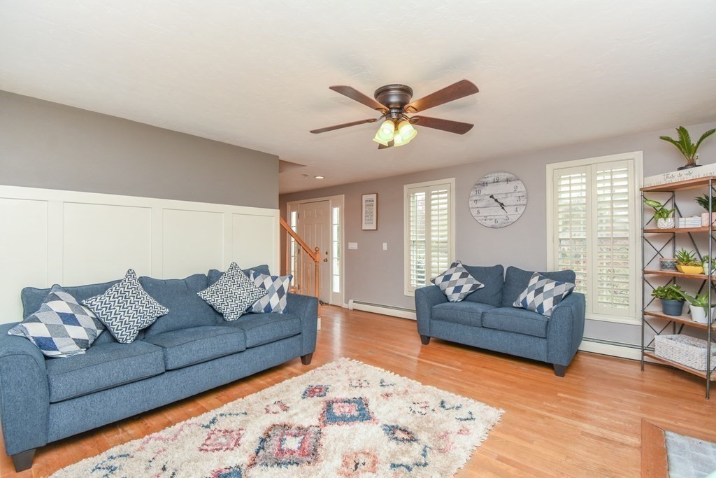 26 Rush Pond Road Lakeville, MA 02347 - Photo 15 of 38 a living room with furniture and a wooden floor