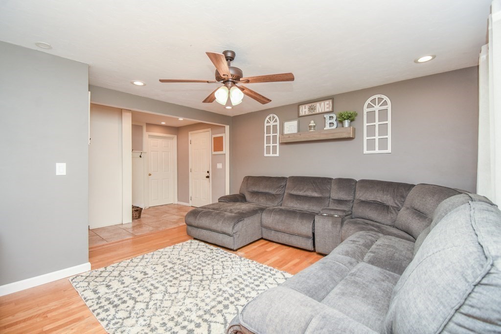 26 Rush Pond Road Lakeville, MA 02347 - Photo 18 of 38 a living room with furniture and a rug
