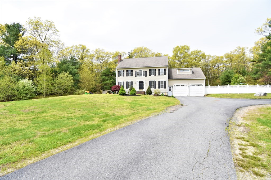 26 Rush Pond Road Lakeville, MA 02347 - Photo 2 of 38 a view of a house with a swimming pool