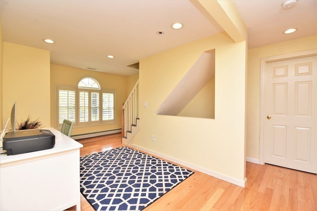 26 Rush Pond Road Lakeville, MA 02347 - Photo 23 of 38 a living room with a couch and a table