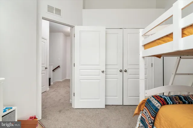 a view of a bedroom with closet