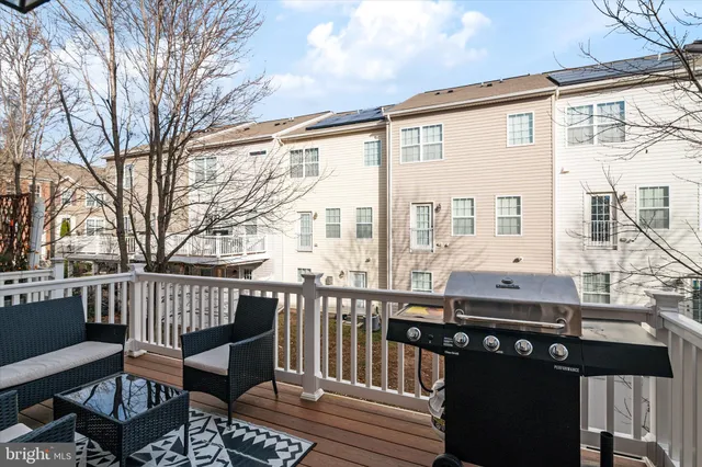 a view of a balcony with chairs