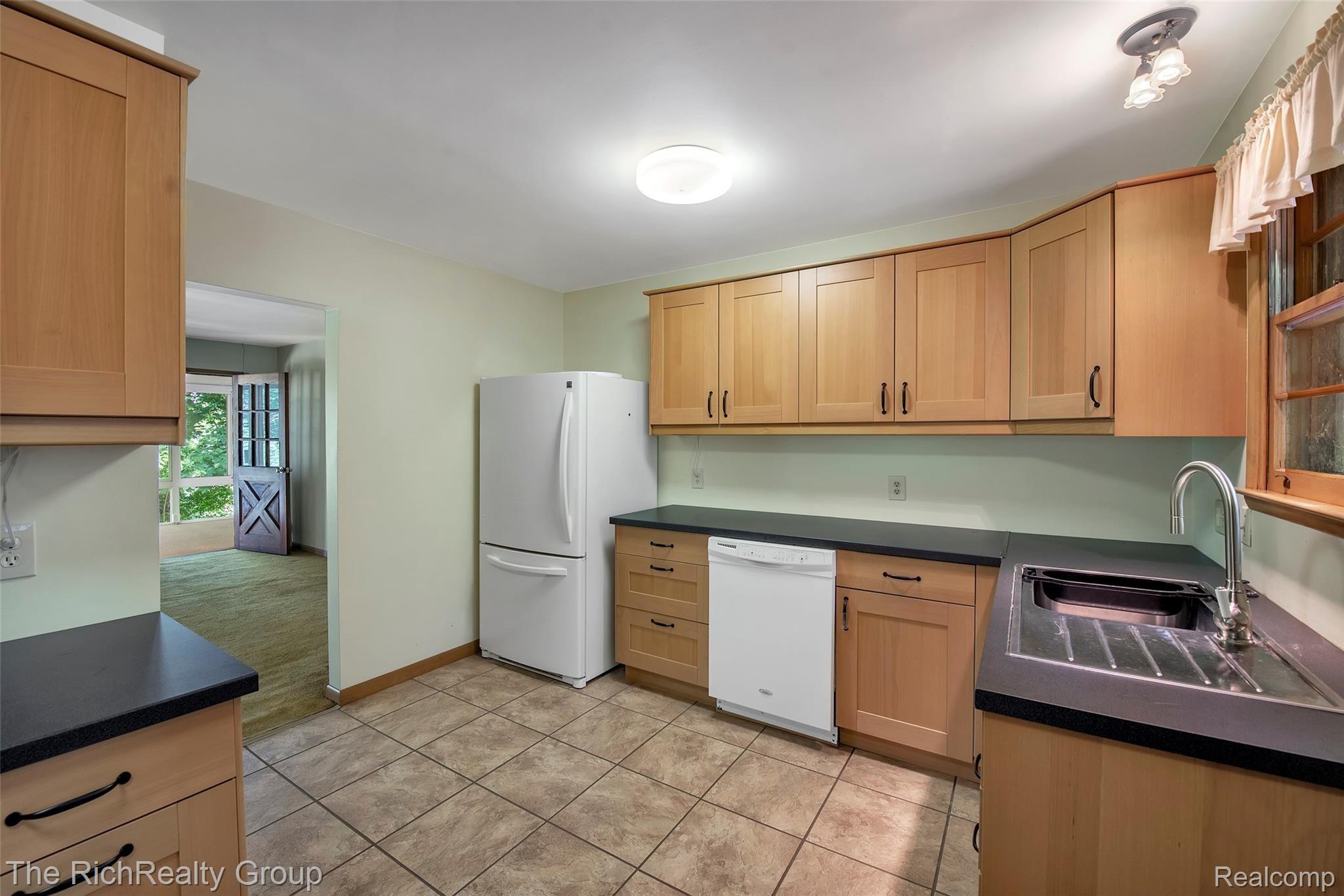 8822 River Valley Road Brighton, MI 48116 - Photo 9 of 44 8822-River-Valley-Rd-Brighton-MI-48116-windowstill-9.jpg