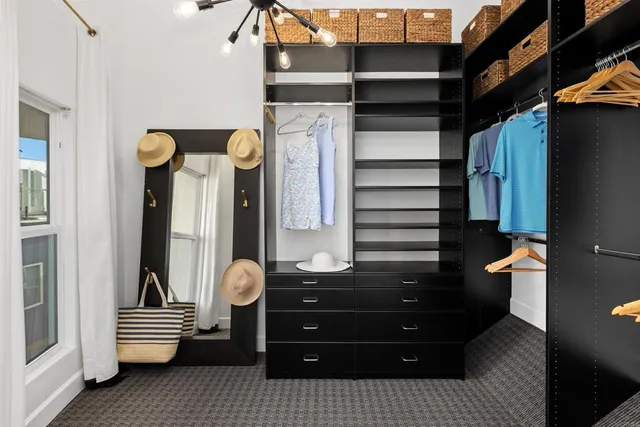 a view of an empty walk in closet