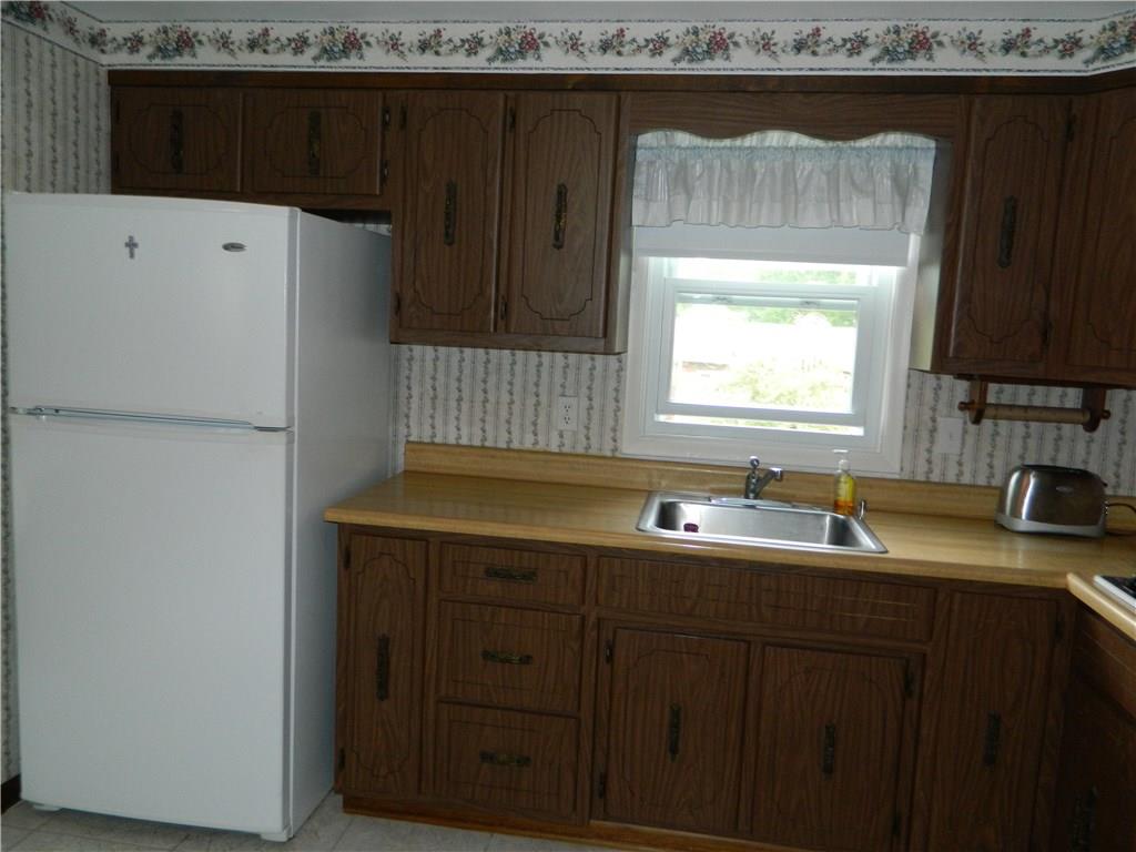 730 North Pike Road Cabot, PA 16023 - Photo 4 of 21 TONS OF CABINET SPACE IN MINT CONDITION, BUILT IN OVEN AND STOVE. APPLIANCES ARE INCLUDED.