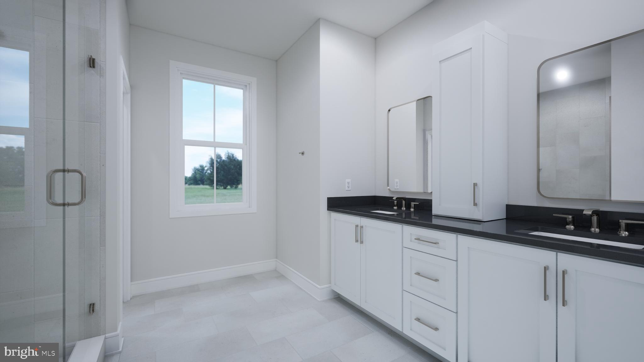 Orchard Grove, Unit STONE Brambleton, VA 20148 - Photo 22 of 53 a bathroom with double sink and a mirror