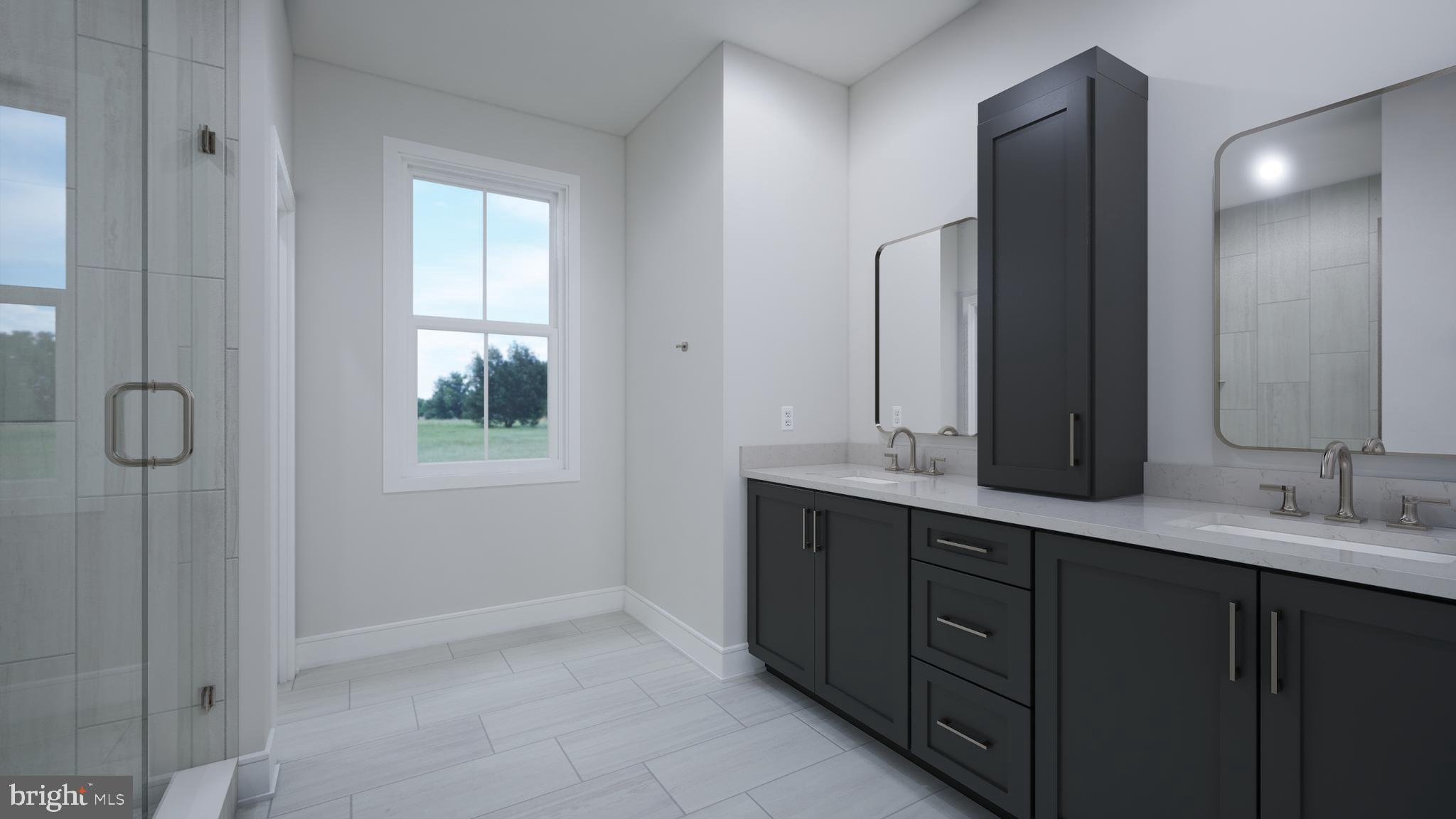 Orchard Grove, Unit STONE Brambleton, VA 20148 - Photo 26 of 53 a bathroom with a double vanity sink and mirror