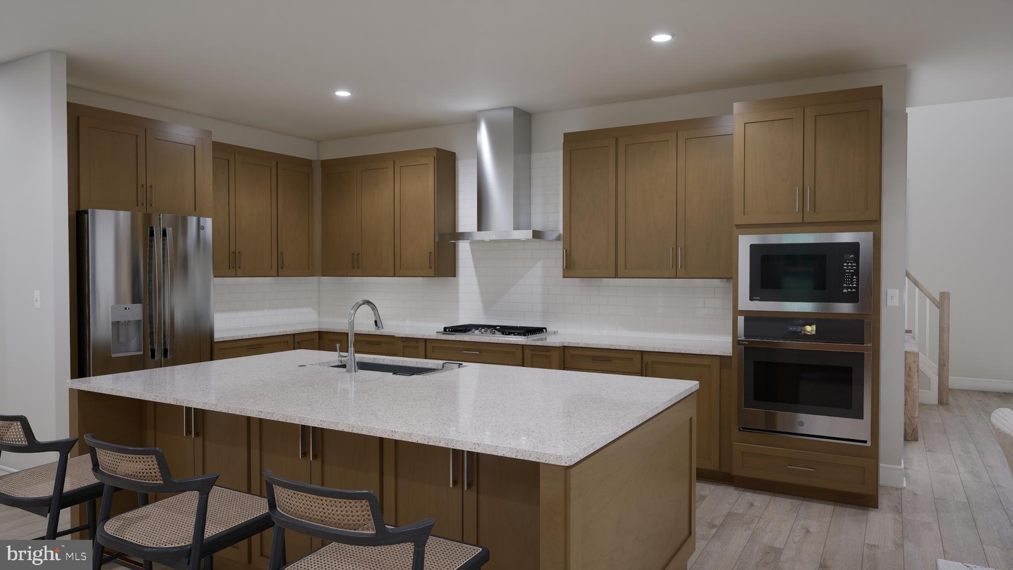 Orchard Grove, Unit STONE Brambleton, VA 20148 - Photo 32 of 53 a kitchen with a table chairs refrigerator and cabinets