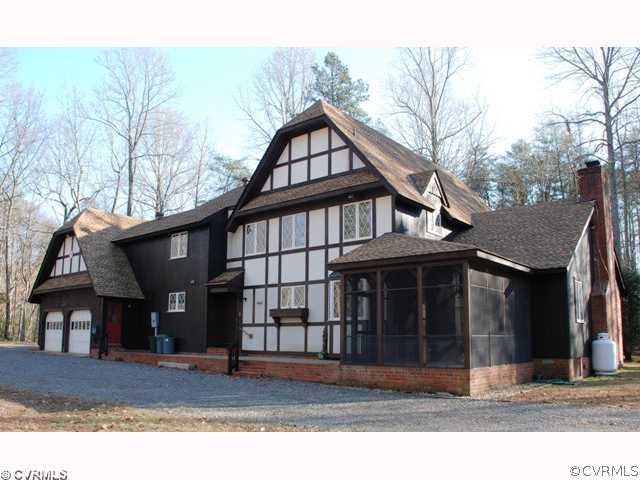 7434 Knightly Road Mechanicsville, VA 23116 - Photo 12 of 12 a front view of a house with a yard