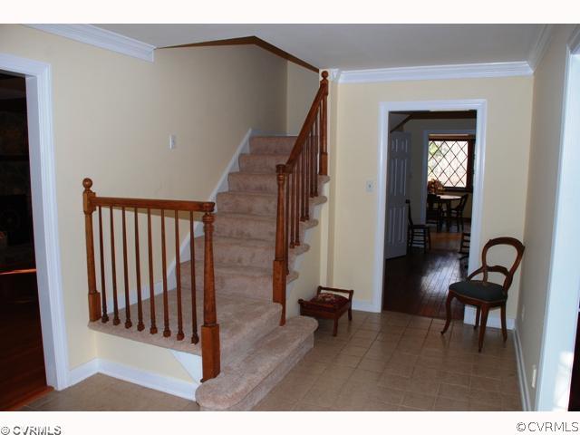 7434 Knightly Road Mechanicsville, VA 23116 - Photo 3 of 12 a view of a livingroom with furniture and hardwood floor