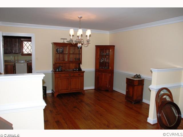 7434 Knightly Road Mechanicsville, VA 23116 - Photo 7 of 12 a view of kitchen and dining room with furniture