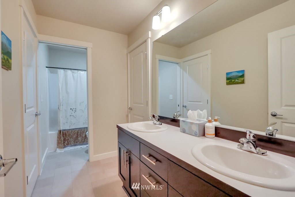 471 Partlon Street Buckley, WA 98321 - Photo 16 of 23 a bedroom with furniture and a window