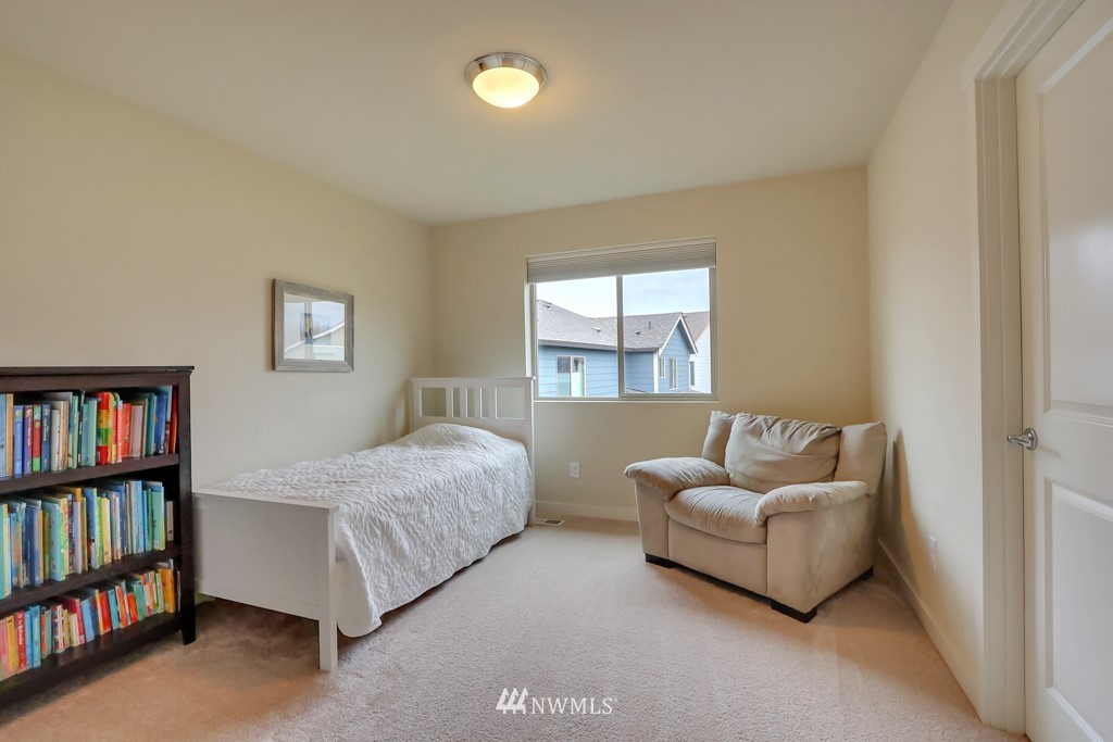 471 Partlon Street Buckley, WA 98321 - Photo 19 of 23 a bedroom with furniture and a window