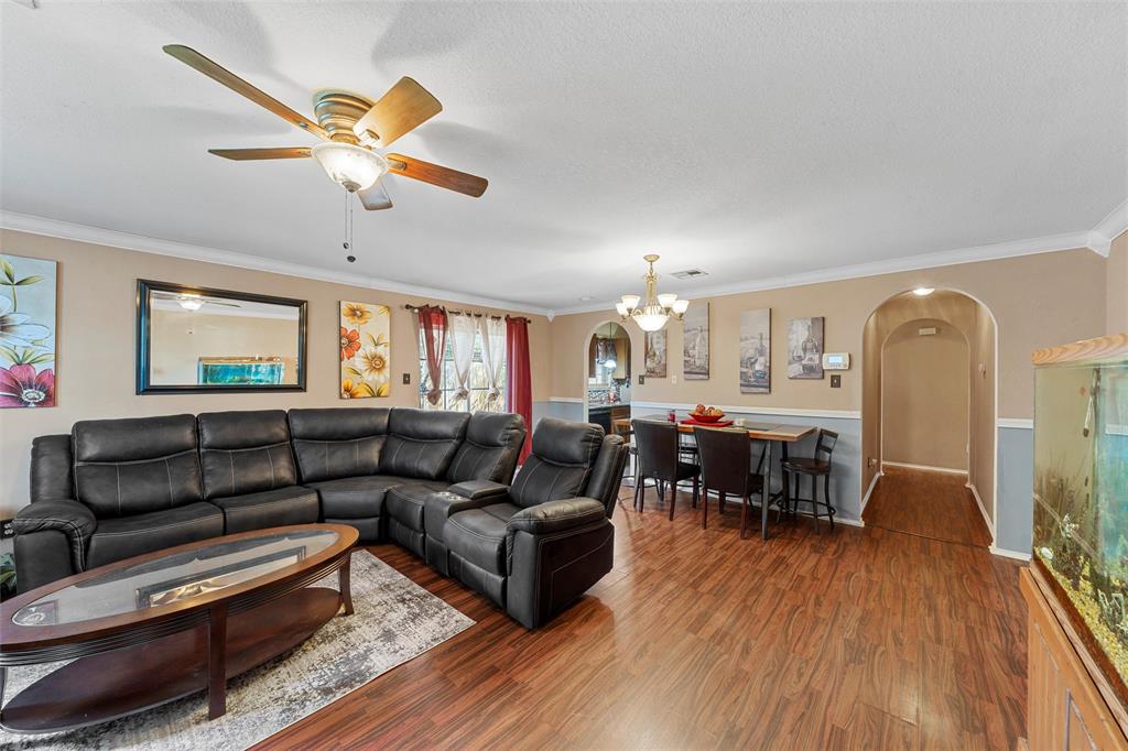 1012 Hatton Street Waco, TX 76704 - Photo 2 of 13 a living room with furniture and wooden floor