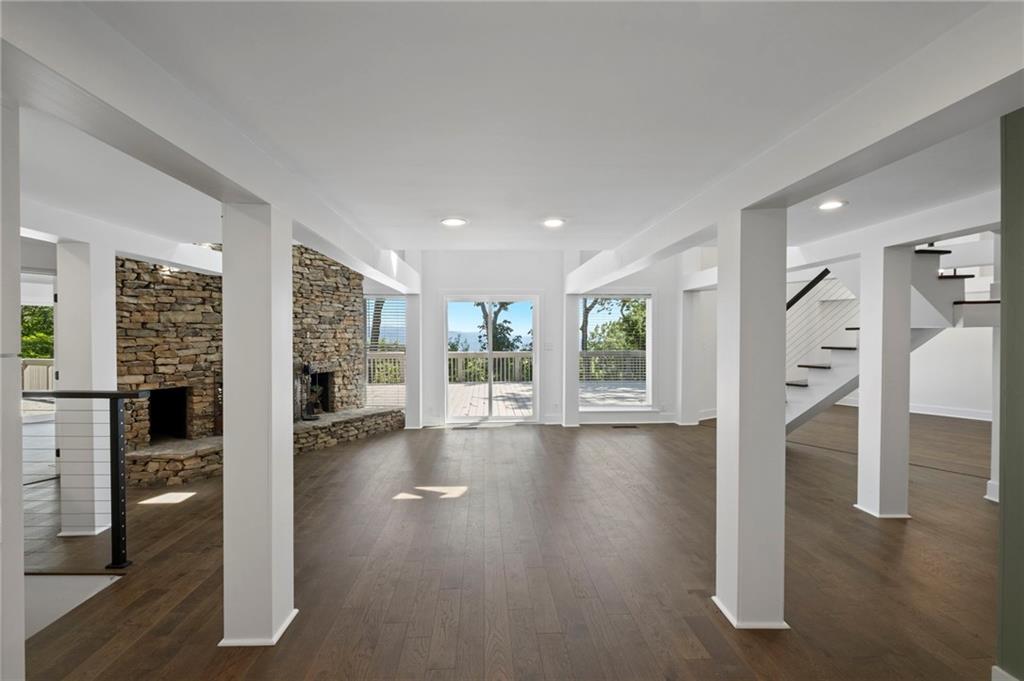62 Bear Cub Ridge Big Canoe, GA 30143 - Photo 12 of 35 a view of interior space with wooden floor and windows