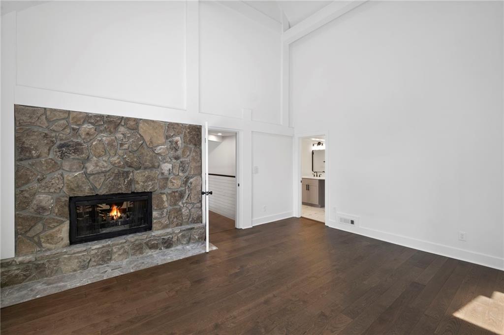 62 Bear Cub Ridge Big Canoe, GA 30143 - Photo 19 of 35 an empty room with a fireplace