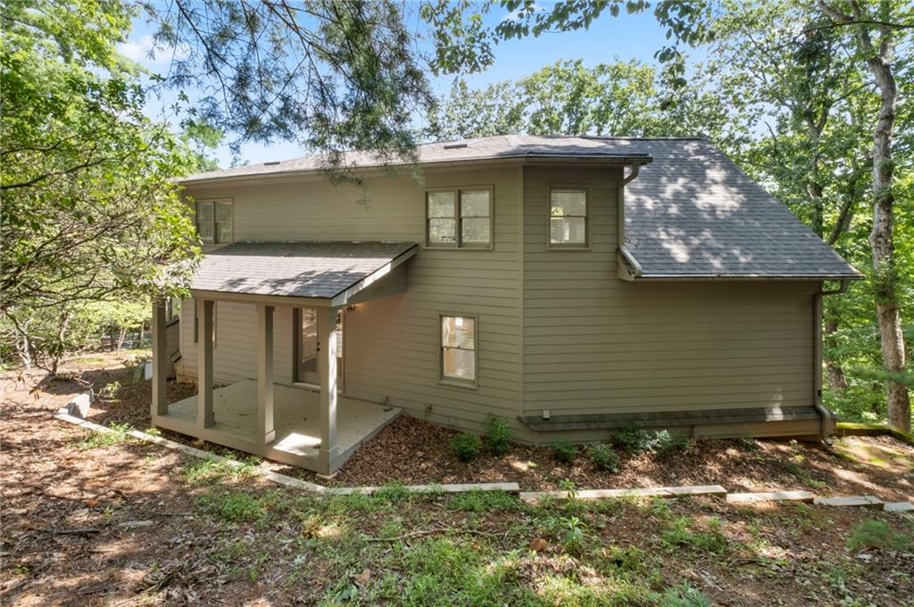 62 Bear Cub Ridge Big Canoe, GA 30143 - Photo 26 of 35 a view of a house with a yard