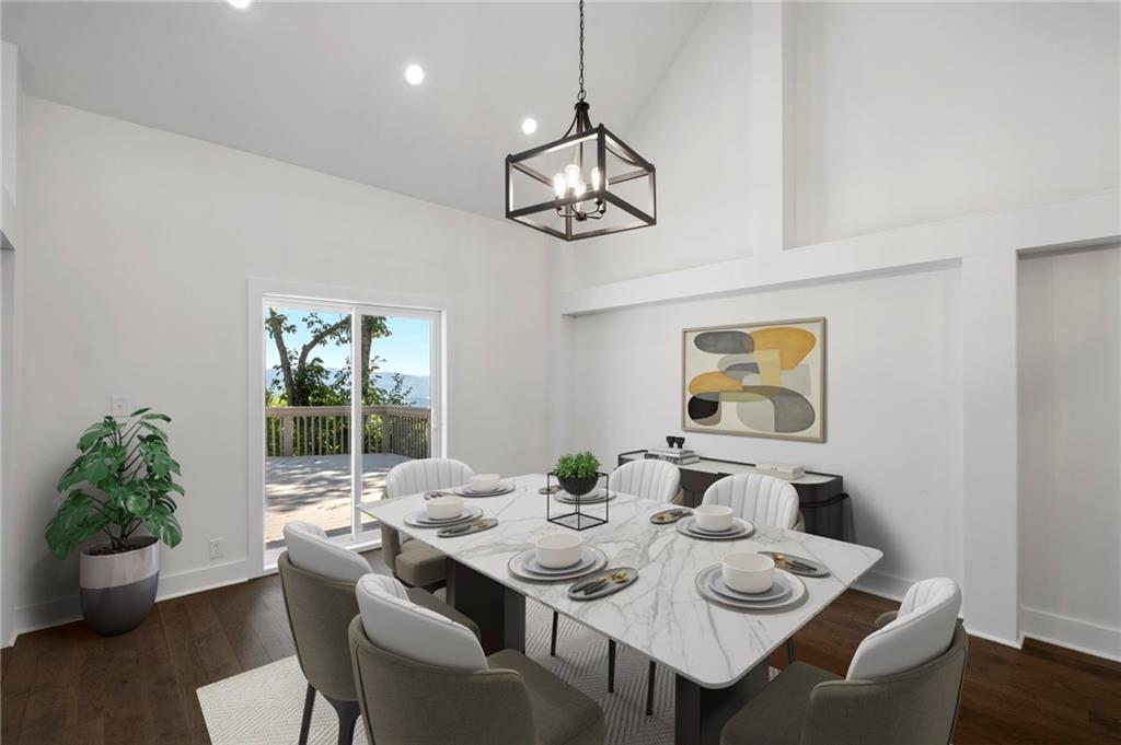 62 Bear Cub Ridge Big Canoe, GA 30143 - Photo 9 of 35 a view of a dining room with furniture window and wooden floor