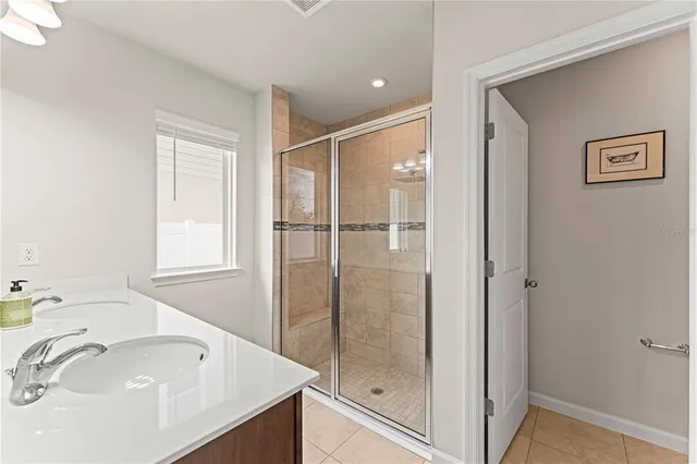 a bathroom with a bathtub and a sink