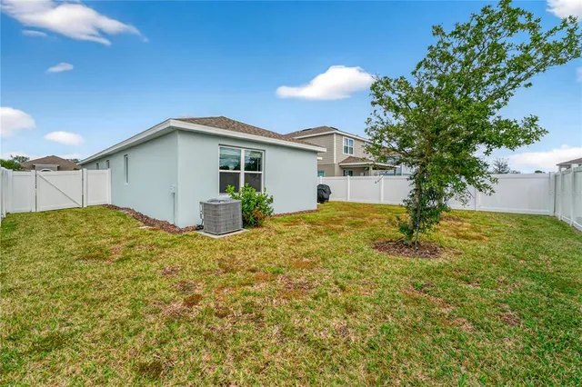 a front view of house with yard