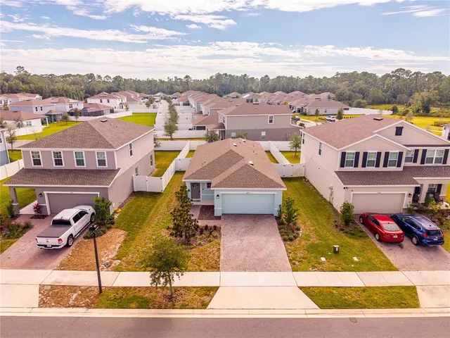 aerial view of a house with a swimming pool