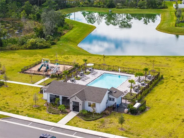 a view of a swimming pool with an ocean view