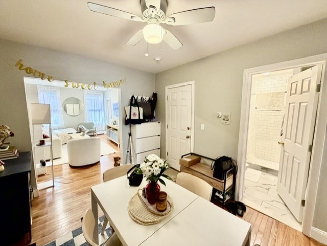 14 Cleveland Place, Unit 3 Boston, MA 02113 - Photo 14 of 22 a living room with furniture and a chandelier
