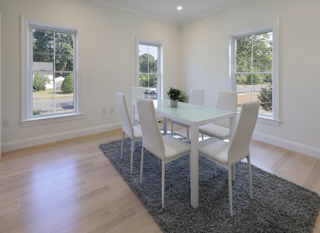 134 Spiers Road Newton, MA 02459 - Photo 15 of 38 a dining room with furniture and window