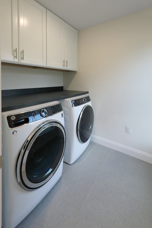 134 Spiers Road Newton, MA 02459 - Photo 28 of 38 a utility room with dryer and washer